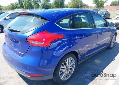 2015 Ford Focus Titanium from USA, damaged, VIN 1FADP3N29FL371969
